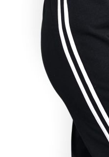 Pantaloni negri, din bumbac flausat, cu doua dungi albe, fara buzunare